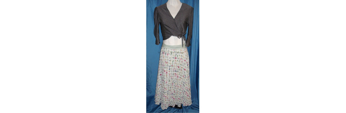 Silver crossover bolero with floral crepe full circle skirt