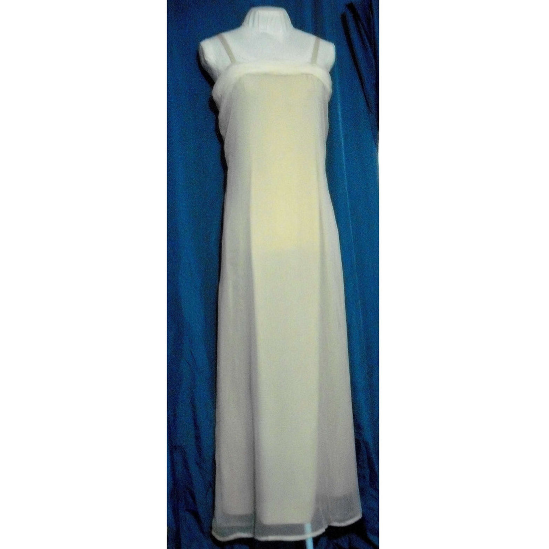 Chiffon overlay dress by Holder Couture