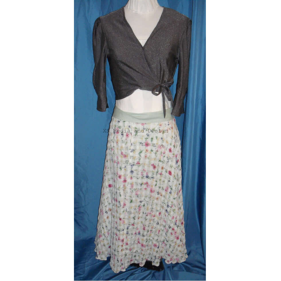 Silver crossover bolero with floral crepe full circle skirt