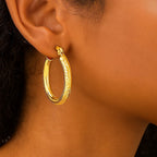 14k Yellow Gold Diamond Cut Textured Oval Hoop Earrings